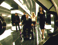 X-Men Team mit Boss (Rollstuhlfahrer) in einem futuristischem Gang
